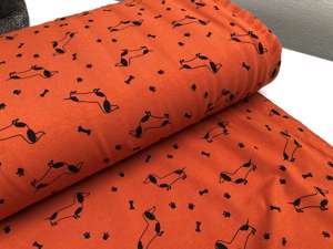 Bomuldsjersey - terracotta farvet med sorte gravhunde